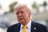 President Donald Trump talks to reporters before he boards Air Force One at Palm Beach International Airport in West Palm Beach, Fla., May 2, 2026, en route to Miami. (AP Photo/Matt Rourke)