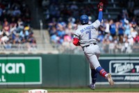 Toronto Blue Jays' Kazuma Okamoto runs the bases after hitting a solo home run against the Minnesota Twins during the sixth inning of a baseball game, May 2, 2026, in Minneapolis. (AP Photo/Matt Krohn)