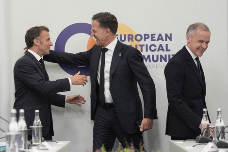 France's President Emmanuel Macron, from left, NATO Secretary General Mark Rutte and Canada's Prime Minister Mark Carney attend the European Political Community summit in Yerevan, Armenia, May 4, 2026. (Stefan Rousseau/Pool Photo via AP)