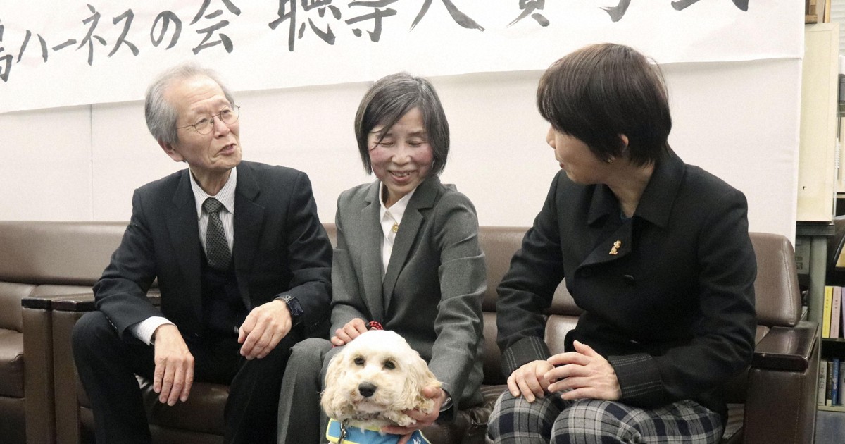 A tap from a dog brings peace of mind for Japan's hearing impaired