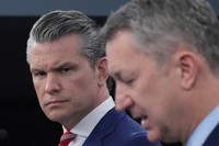 Defense Secretary Pete Hegseth and Chairman of the Joint Chiefs of Staff Gen. Dan Caine speak to members of the media during a press briefing at the Pentagon in Washington, May 5, 2026. (AP Photo/Manuel Balce Ceneta)