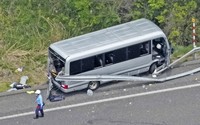 This photo taken from a Kyodo News helicopter on May 6, 2026, shows a bus that crashed into a guardrail on the Banetsu Expressway in Koriyama, Fukushima Prefecture. (Kyodo) 