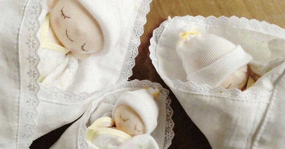 Students in Japan stitch 'angel gowns' for families facing stillbirths