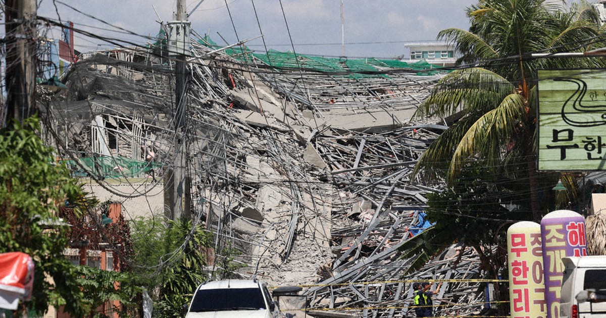 A 9-story building under construction in Philippines collapses, possibly trapping dozens of workers