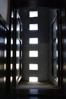 Vertically aligned square light wells that bathe the interior in gentle light are seen at the Iwakuni Chokokan museum in Iwakuni, Yamaguchi Prefecture, July 23, 2024. (Mainichi/Minoru Kanazawa)