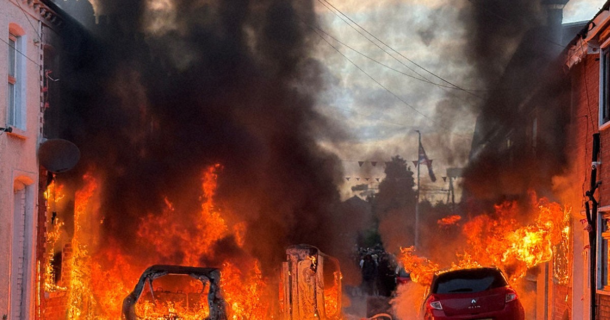Police blast water cannons at Belfast protesters as unrest flares again after stabbing