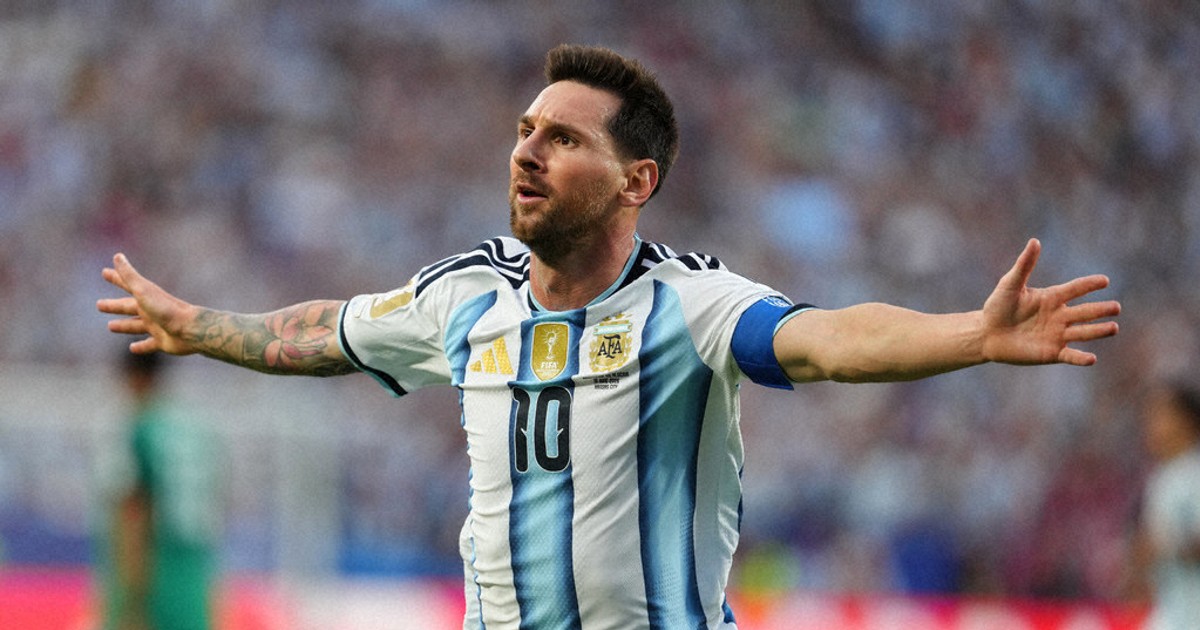 Messi has his first World Cup hat trick as defending champion Argentina beats Algeria 3-0 in opener