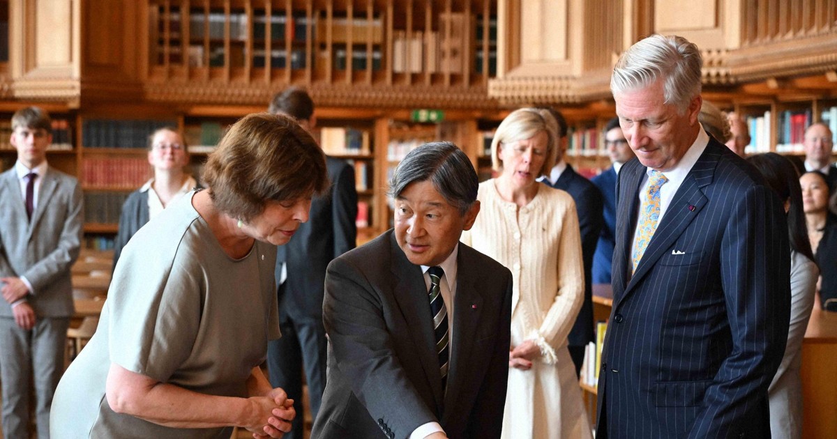 Emperor Naruhito visits Belgian university, views Japan-donated books