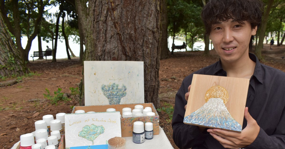 Japan wood painter who works with timber left by late grandfather holds exhibition