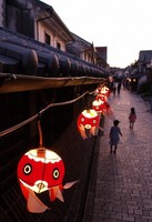 Yanai goldfish lanterns glow along the 